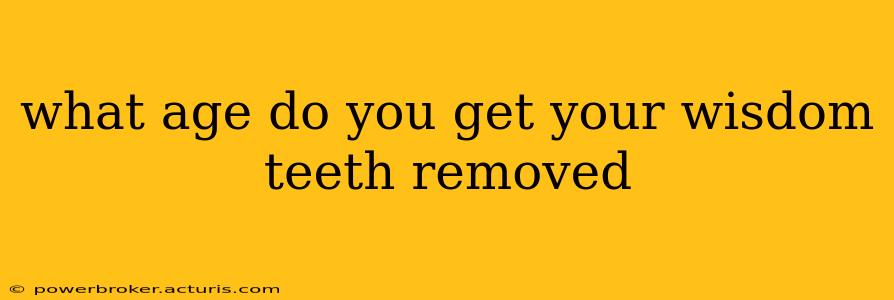 what age do you get your wisdom teeth removed